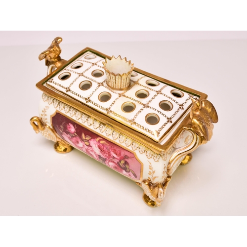 213 - A Coalport bough pot with pierced cover, circa 1820, the rectangular bombe body with twin handles su... 