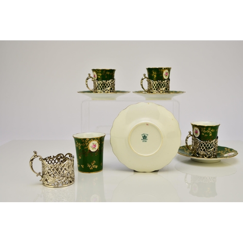 216 - A cased Coalport coffee service with silver mounts, hallmarked for James Dixon and Sons, Sheffield, ... 