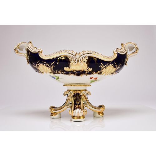 220 - An unusual standing Coalport dessert centrepiece, circa 1830 of twin-handled form, raised on four fe... 