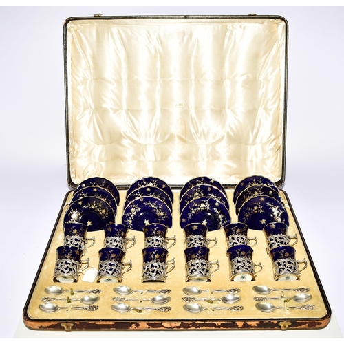 223 - An impressive Coalport cased silver mounted coffee service, dark cobalt ground decorated with gilt f... 