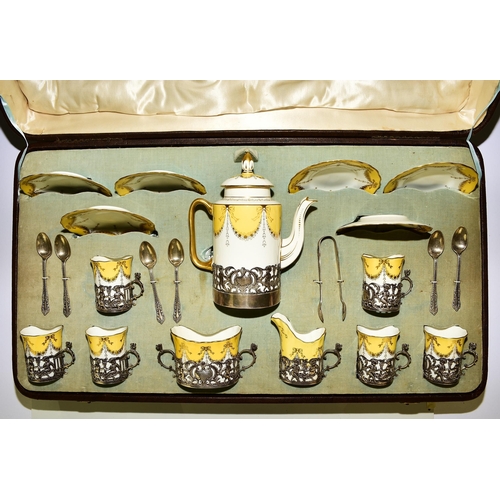 224 - A Coalport cased silver mounted coffee service, hallmarked for Jay, Richard Attenborough Co Ltd, Che... 