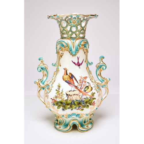 225 - A good Coalport vase, circa 1845 of scrolling twin-handled form, with a reticulated upper rim, the e... 