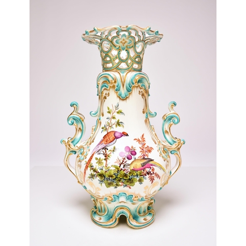 225 - A good Coalport vase, circa 1845 of scrolling twin-handled form, with a reticulated upper rim, the e... 