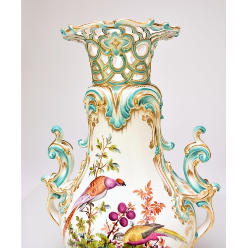 225 - A good Coalport vase, circa 1845 of scrolling twin-handled form, with a reticulated upper rim, the e... 