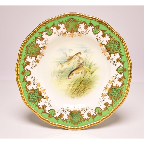 227 - A set of four Coalport ichthyological dessert plates, early 20th century apple green and gilt border... 