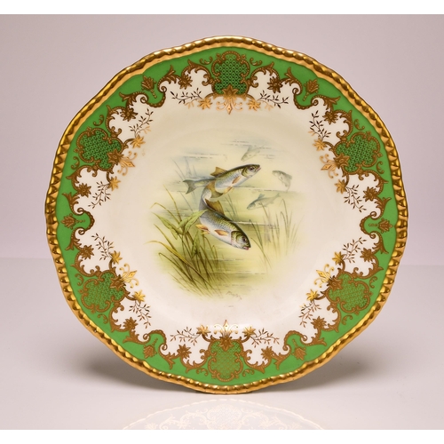 227 - A set of four Coalport ichthyological dessert plates, early 20th century apple green and gilt border... 