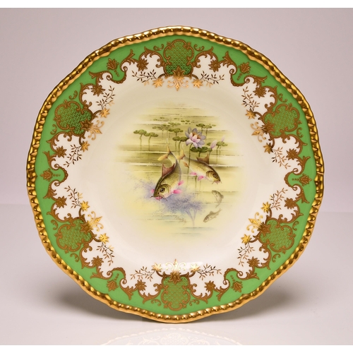 227 - A set of four Coalport ichthyological dessert plates, early 20th century apple green and gilt border... 