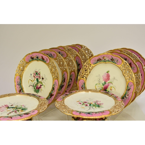 228 - A Coalport dessert service, circa 1860 comprising ten plates and four comports, centrally painted in... 