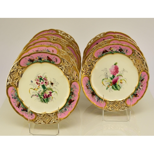 228 - A Coalport dessert service, circa 1860 comprising ten plates and four comports, centrally painted in... 