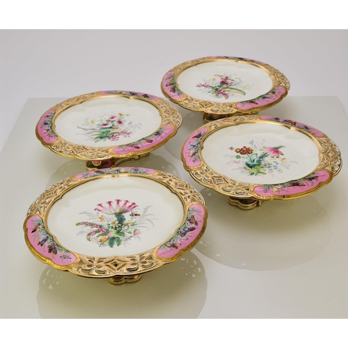 228 - A Coalport dessert service, circa 1860 comprising ten plates and four comports, centrally painted in... 