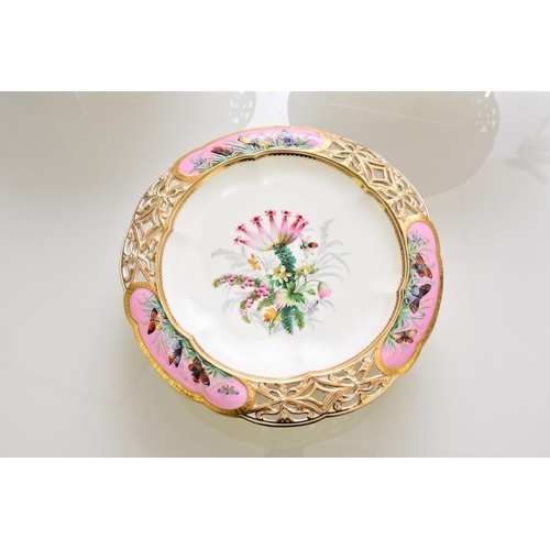 228 - A Coalport dessert service, circa 1860 comprising ten plates and four comports, centrally painted in... 