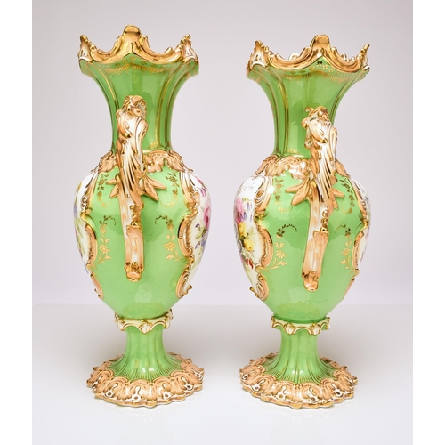 230 - A pair of Coalport twin-handled vases, circa 1830-40 the apple green grounds with peachy yellow acce... 