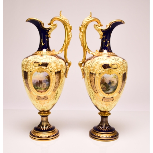 232 - A pair of good quality Coalport ewers, early 20th century, of baluster form with gilt scrolling hand... 