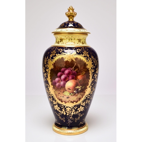 233 - A Coalport baluster vase and cover, circa 1920s the deep cobalt and lavish gilt ground painted with ... 