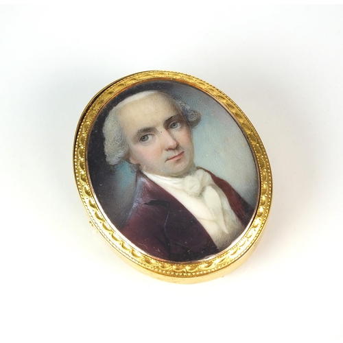 26 - An early 19th century ivory miniature brooch / pendant, the portrait miniature depicting a gentleman... 