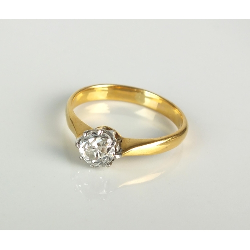 29 - A single stone diamond ring, the old cut diamond claw set in white metal to yellow metal shank, not ... 