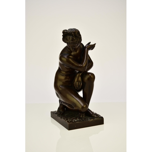 314 - A bronze figure of the crouching Venus, after the antique The nude figure in kneeling position besid... 