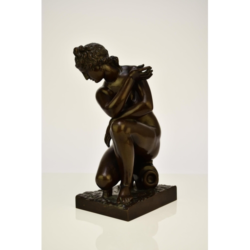 314 - A bronze figure of the crouching Venus, after the antique The nude figure in kneeling position besid... 