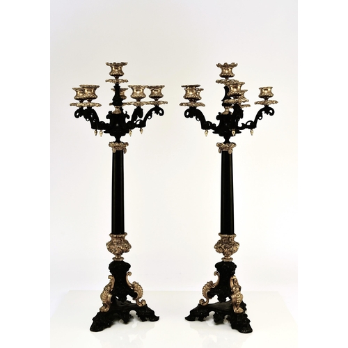 316 - A pair of bronze, ormolu and marble candelabra, late 19th century With five scroll branches having g... 