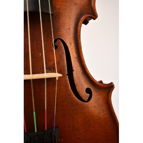 318 - An English violin by and labelled Walter H. Mayson, Manchester, A.D. 1880 Inscribed in ink on the la... 