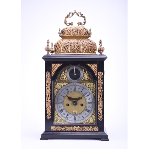 320 - A fine and rare early 18th century ebonised quarter repeating double basket top bracket clock James ... 