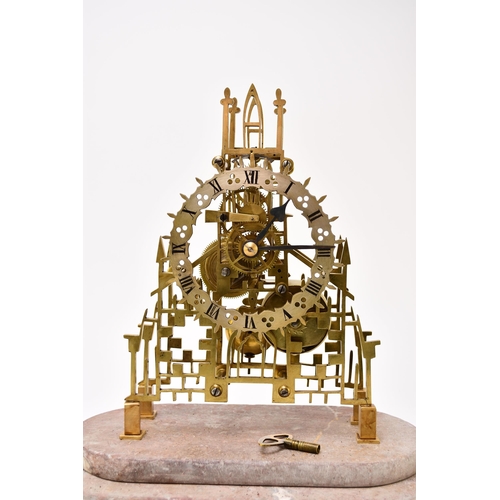 322 - A late 19th century lacquered brass skeleton timepiece with original dome The elaborate Gothic influ... 