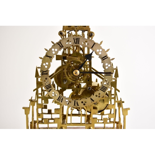 322 - A late 19th century lacquered brass skeleton timepiece with original dome The elaborate Gothic influ... 