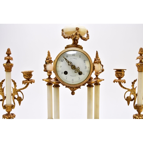 324 - A late 19th century French Portico clock garniture The movement stamped A.D. Mougin The clock surmou... 