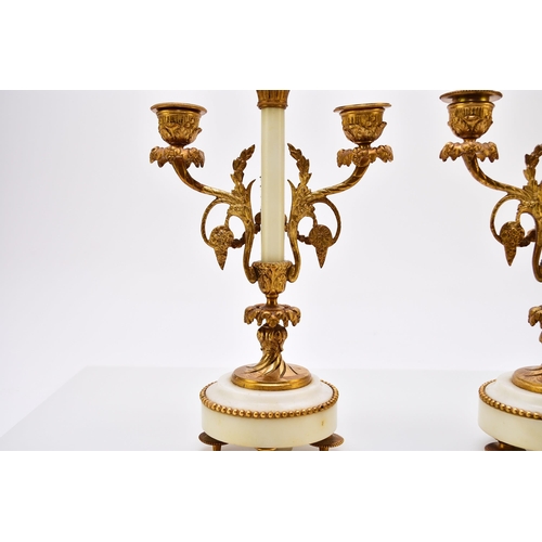 324 - A late 19th century French Portico clock garniture The movement stamped A.D. Mougin The clock surmou... 