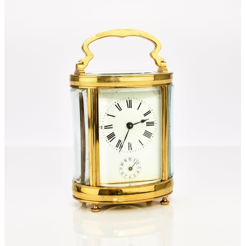 326 - A French brass oval carriage alarm clock, early 20th century The 2 1/4in white enamel dial with Roma... 