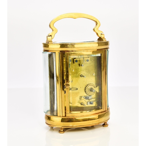 326 - A French brass oval carriage alarm clock, early 20th century The 2 1/4in white enamel dial with Roma... 