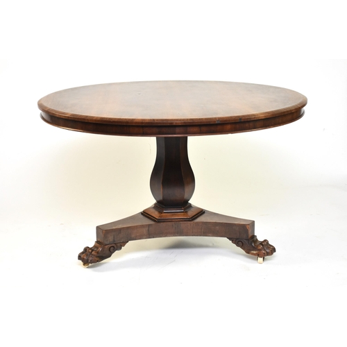 346 - A Victorian rosewood tilt-top breakfast table The circular top raised on a hexagonal vase stem on a ... 