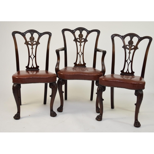 353 - A set of six mahogany Chippendale style dining chairs With pierced and carved splats, tan leather st... 