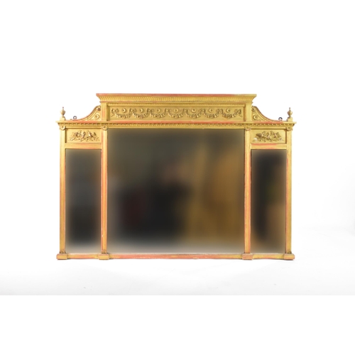 357 - A 19th century Regency revival three-glass overmantel mirror The three rectangular plates within a g... 