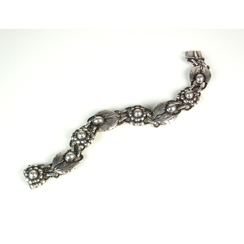 38 - A Georg Jensen silver bracelet, each link of foliate design with elongated oval links, design number... 