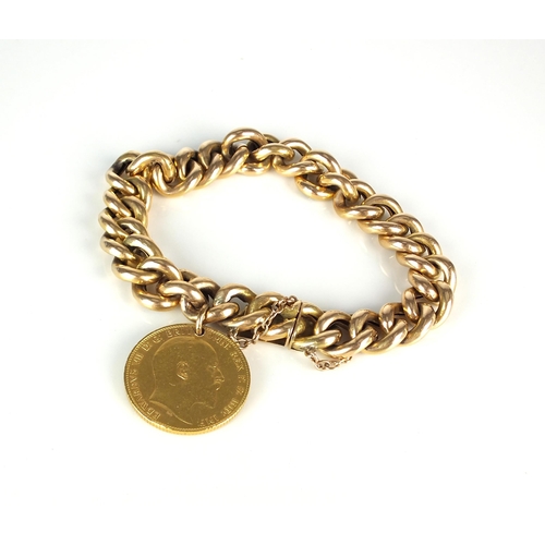 49 - A yellow metal hollow curb link bracelet, with push clasp stamped '15ct', suspending a sovereign dat... 