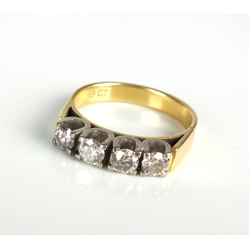 87 - A four stone diamond ring, the four uniform brilliant cut diamonds claw set in white metal to yellow... 