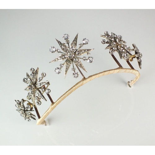 98 - A late 19th century paste tiara, designed as a row of five graduated stylised twelve rayed stars eac... 