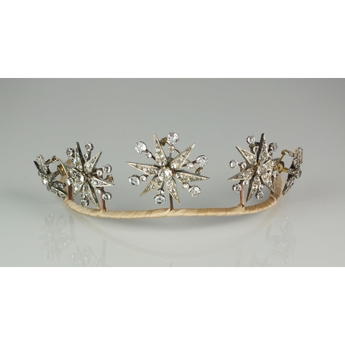 98 - A late 19th century paste tiara, designed as a row of five graduated stylised twelve rayed stars eac... 