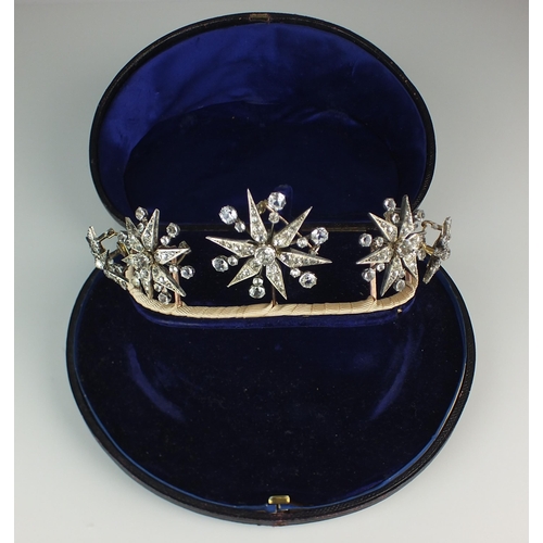 98 - A late 19th century paste tiara, designed as a row of five graduated stylised twelve rayed stars eac... 