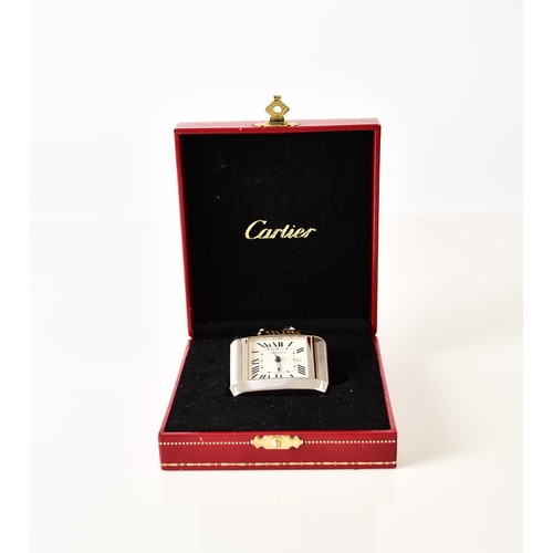 122 - Cartier: A stainless steel folding dual-time alarm clock Model: Tank Francaise Reference: 2945 Date:... 