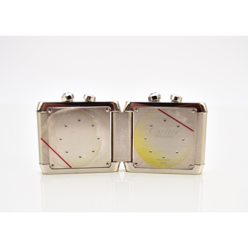 122 - Cartier: A stainless steel folding dual-time alarm clock Model: Tank Francaise Reference: 2945 Date:... 