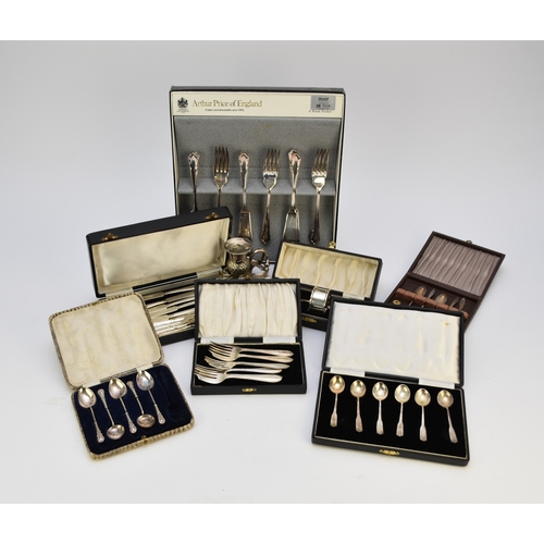 26 - A collection of silver and plated wares, to include; a cased set of six white metal coffee spoons st... 