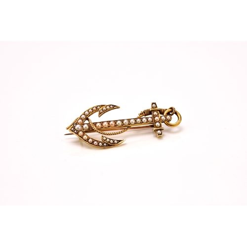 366 - A late 19th century 'fouled anchor' split seed pearl brooch, the split seed pearl anchor set with ye... 