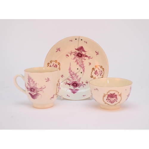 11 - A group of Worcester 18th century porcelain, comprising a trio of a coffee cup, a tea bowl and a sau... 