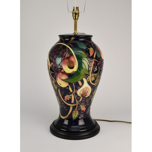 145 - A Moorcroft large baluster table lamp in the 'Queens Choice' pattern designed by Emma Bossons, 44.5... 