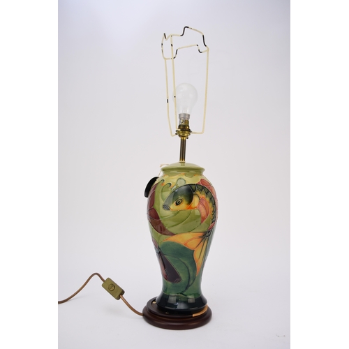 147 - A Moorcroft lamp in the Carp pattern designed by Sally Tuffin, height excluding base and fittings ... 