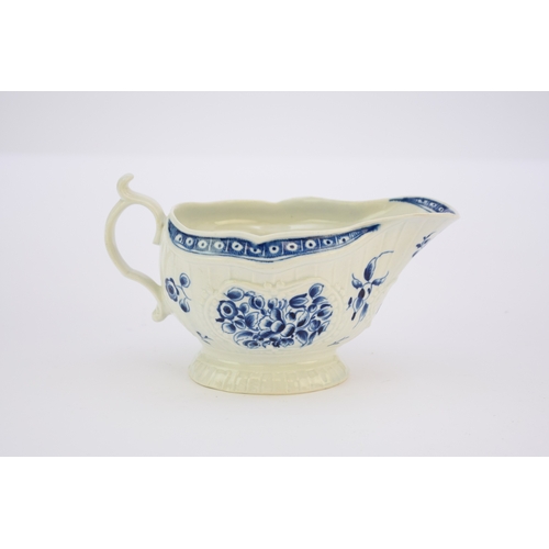 2 - A large Worcester 'Strap-fluted Floral' sauceboat circa 1770-75 painted in underglaze blue, moulded ... 