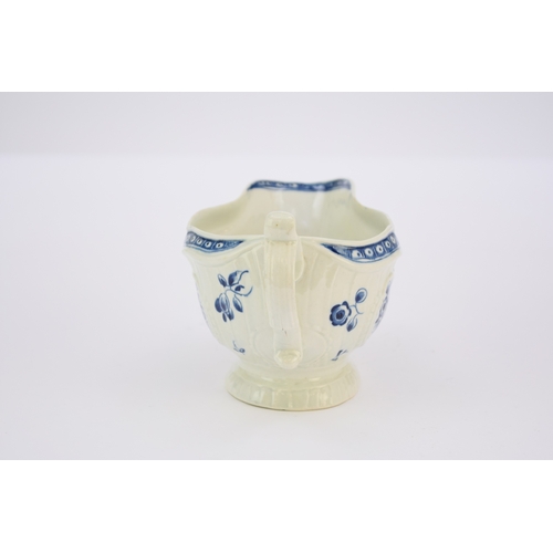 2 - A large Worcester 'Strap-fluted Floral' sauceboat circa 1770-75 painted in underglaze blue, moulded ... 