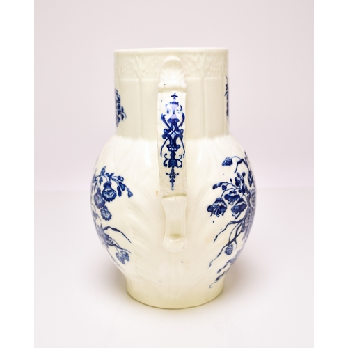 21 - A Caughley 'Bouquets' cabbage leaf maskhead jug, circa 1780-85, transfer-printed in underglaze blue,... 